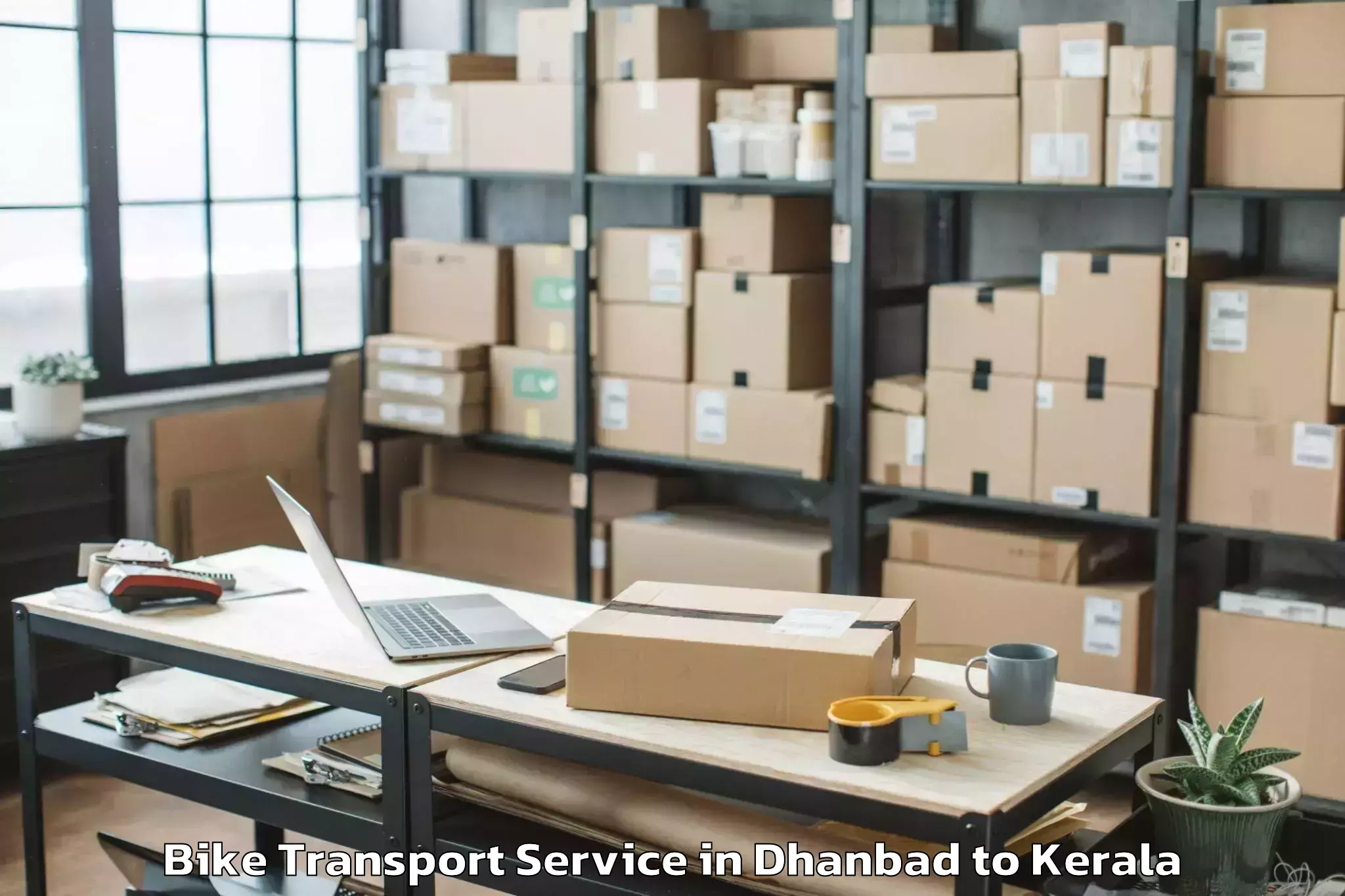 Book Your Dhanbad to Karipur Bike Transport Today